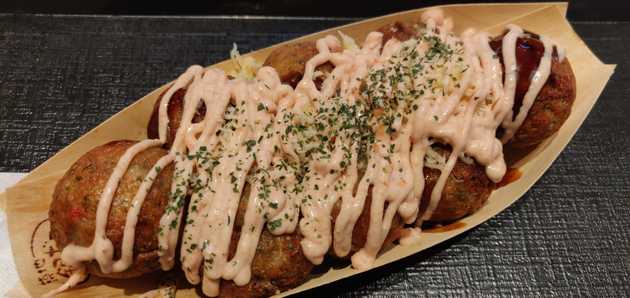 Takoyaki with cheese and mentai sauce on top